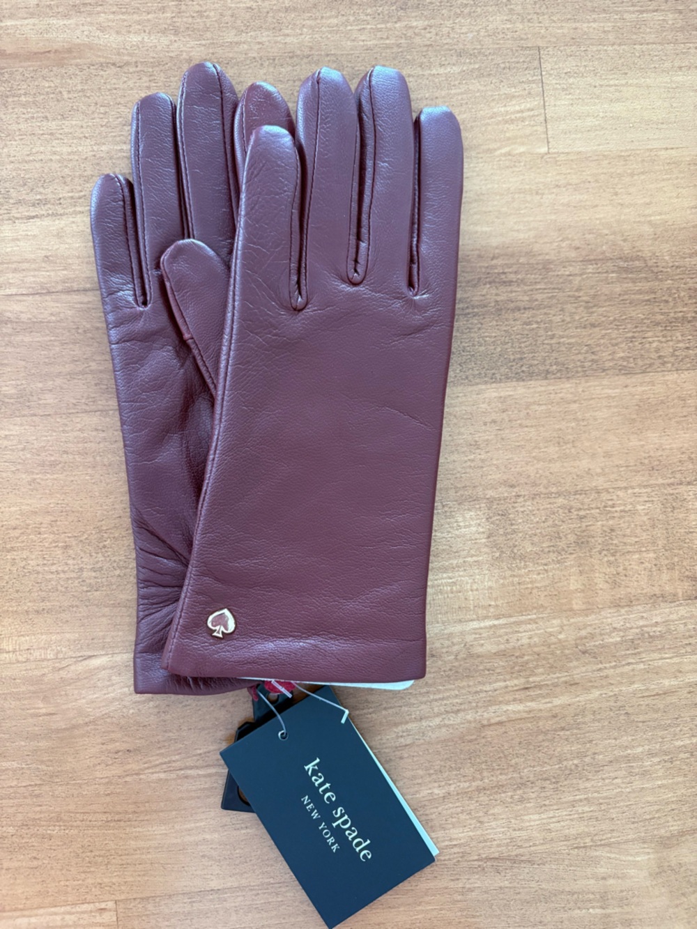 kate spade deep lipstick leather gloves with gold spade hardware